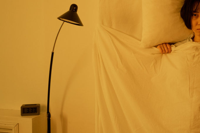 Personne éveillée dans son lit par une nuit chaude d'été